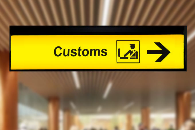 customs sign at airport